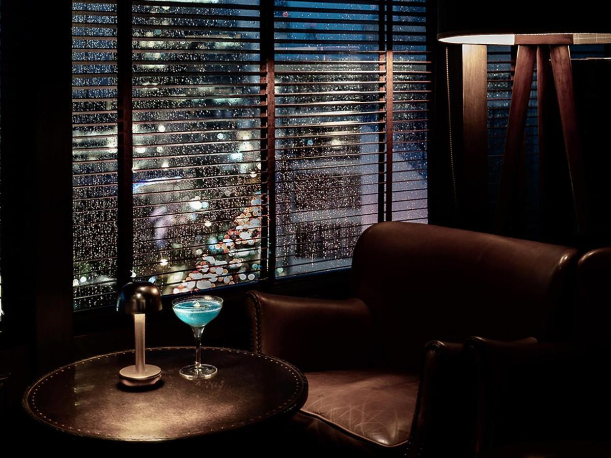 Muu Bangkok, Small Luxury Hotels Of The World Экстерьер фото The bar at the Mandarin Oriental, Hong Kong