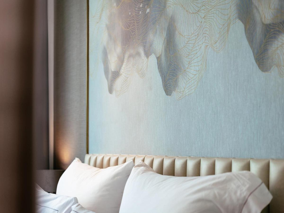 Muu Bangkok, Small Luxury Hotels Of The World Экстерьер фото A bed with two pillows