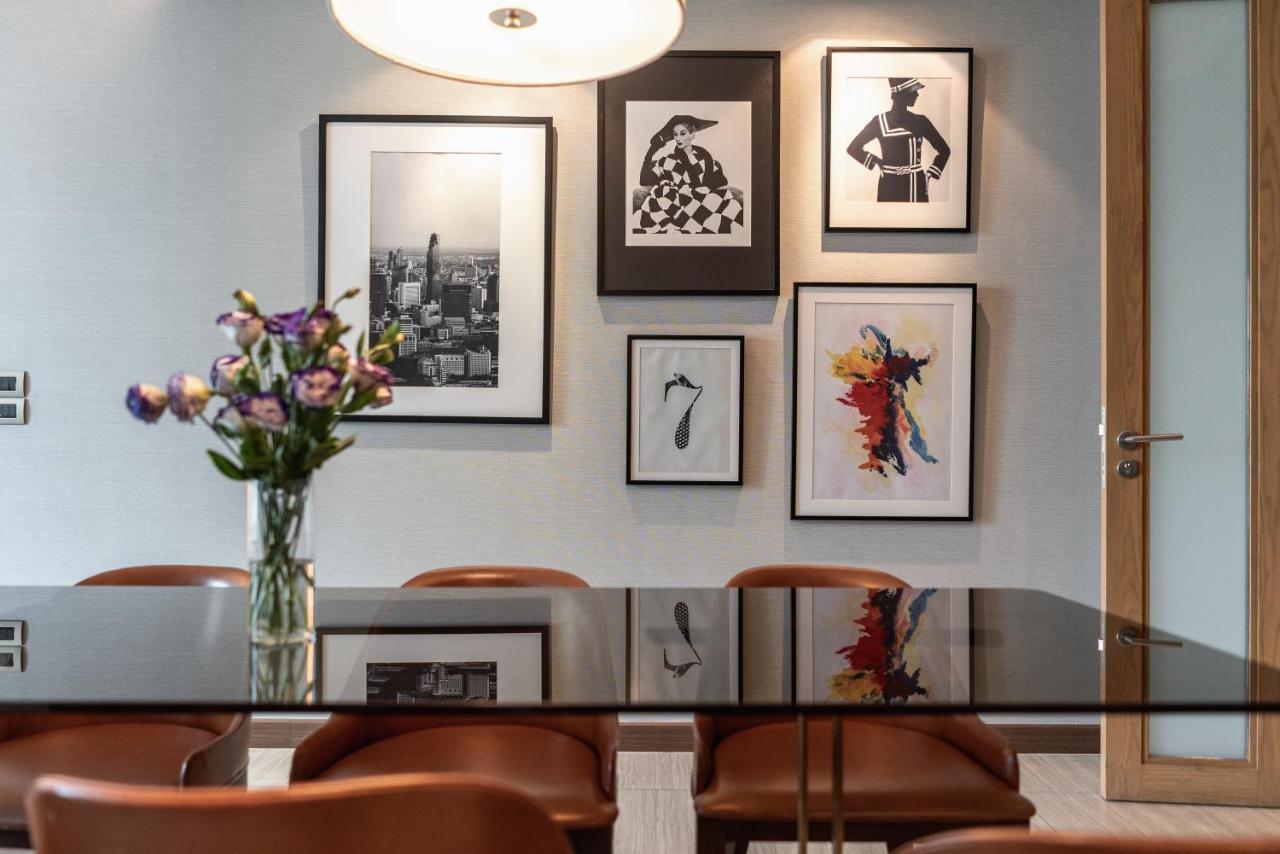 Muu Bangkok, Small Luxury Hotels Of The World Экстерьер фото A collection of prints by various artists